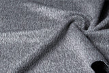 a close up of the texture of silver alpaca wool fabric